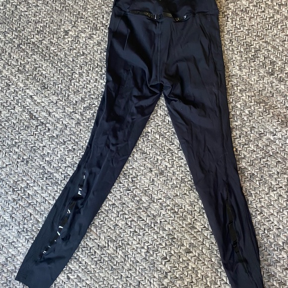 High waisted size 4 black shiny stripe on black leggings. Stripe entire of 25”. - Picture 4 of 7